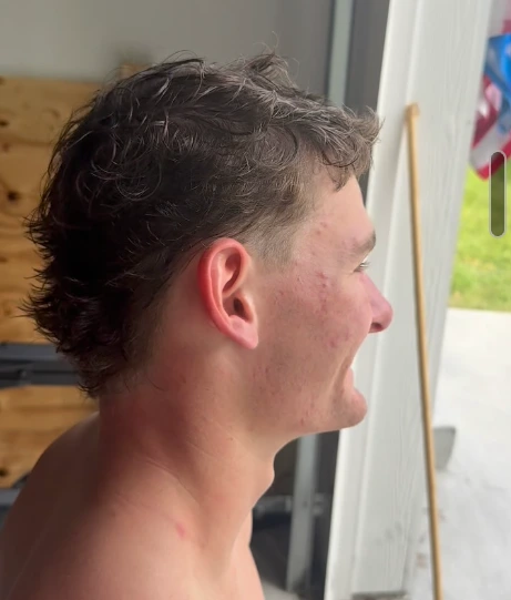 Side profile showing a close taper and textured length